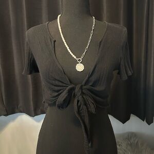 Black tie-front top with gold chain detail #partytop